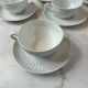 Set of 4 porcelain cups and saucers F. Chauvigny