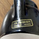 Navy blue stoneware pitcher