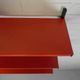 Tomado Holland - A. Dekker wall shelf, orange and black, 1970s