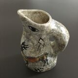 Zoomorphic pitcher parietal decoration