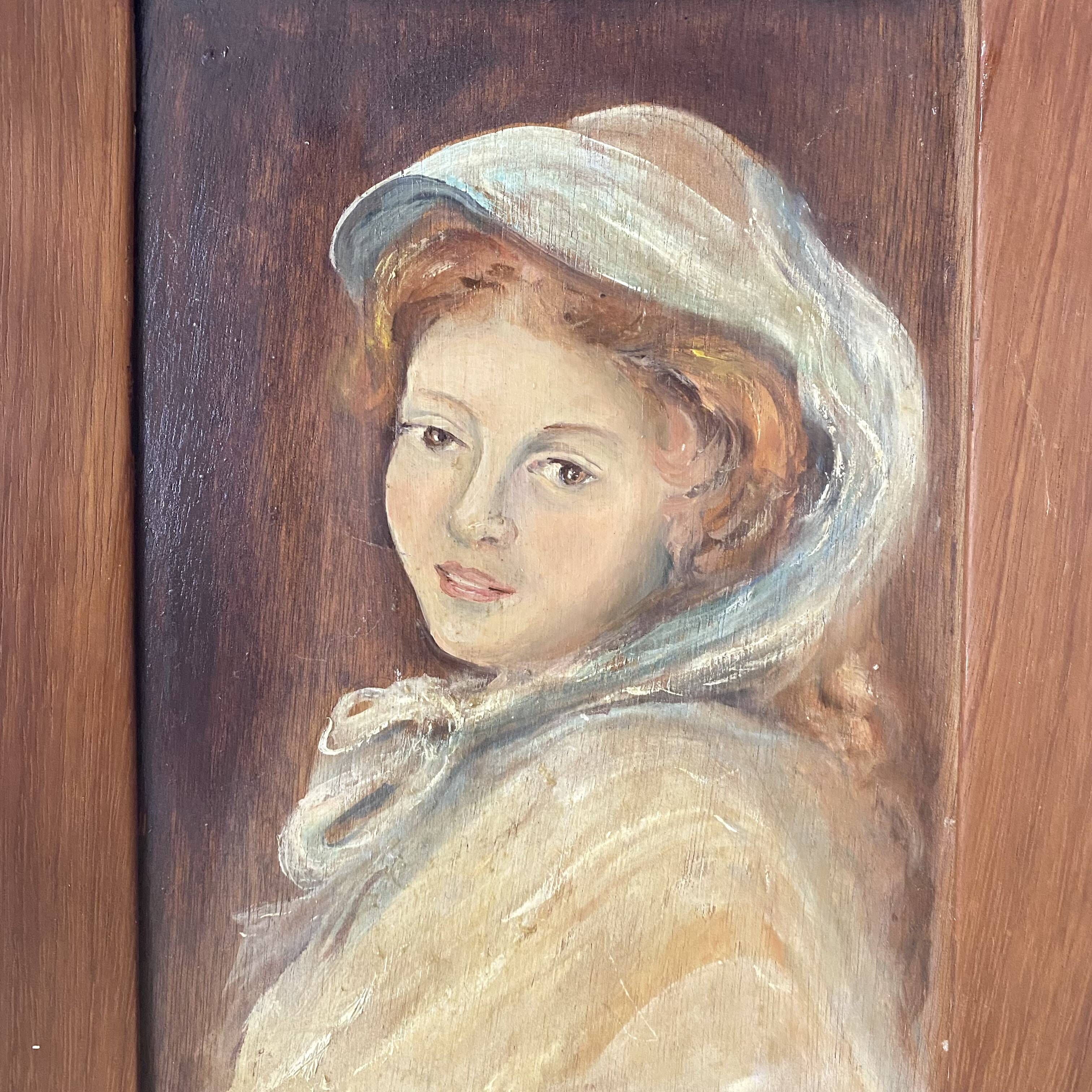 Old oil portrait on wood of a young woman