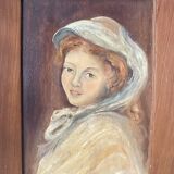 Old oil portrait on wood of a young woman