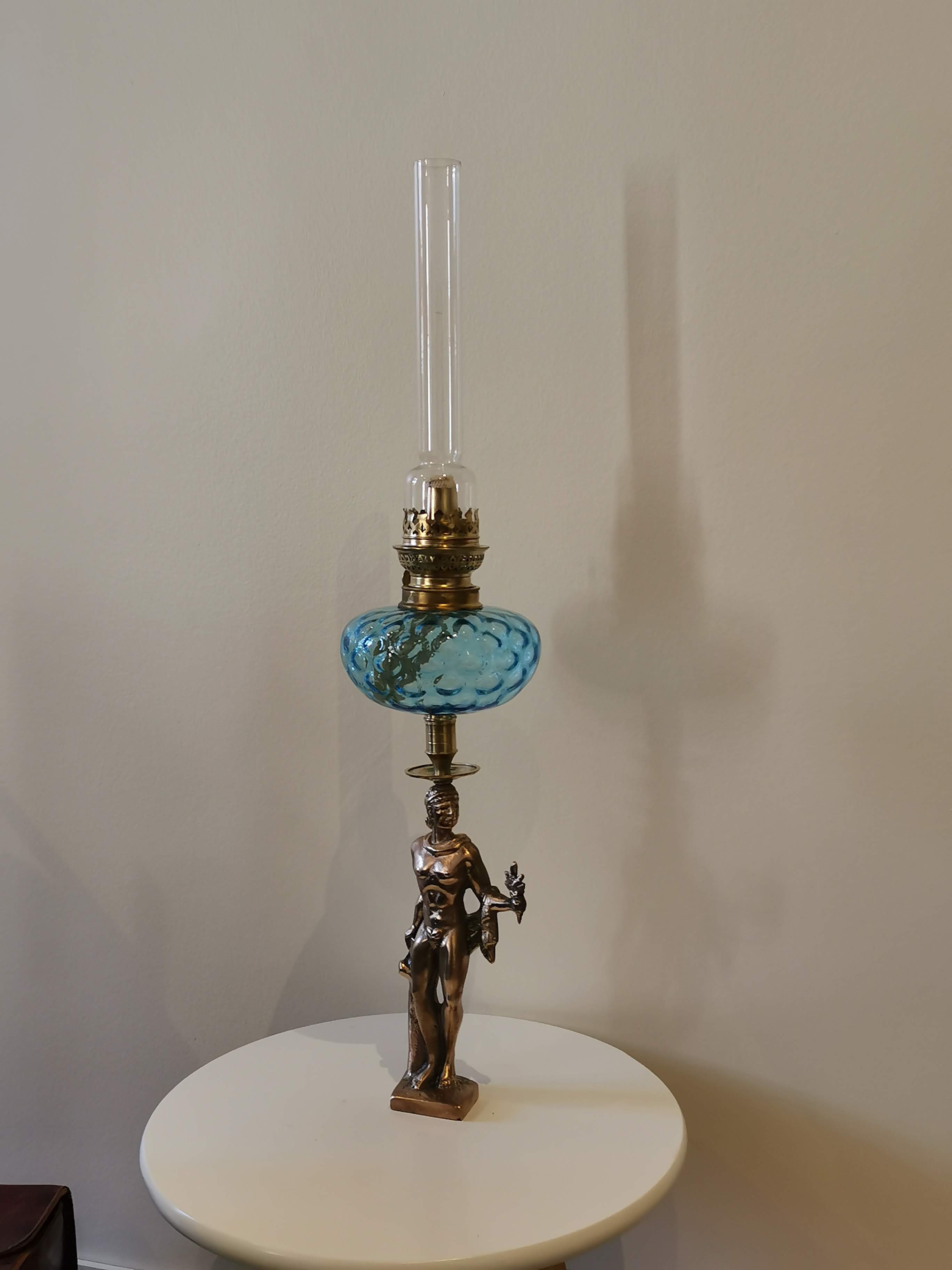Large kerosene lamp mounted on bronze statue. Late nineteenth century