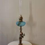 Large kerosene lamp mounted on bronze statue. Late nineteenth century
