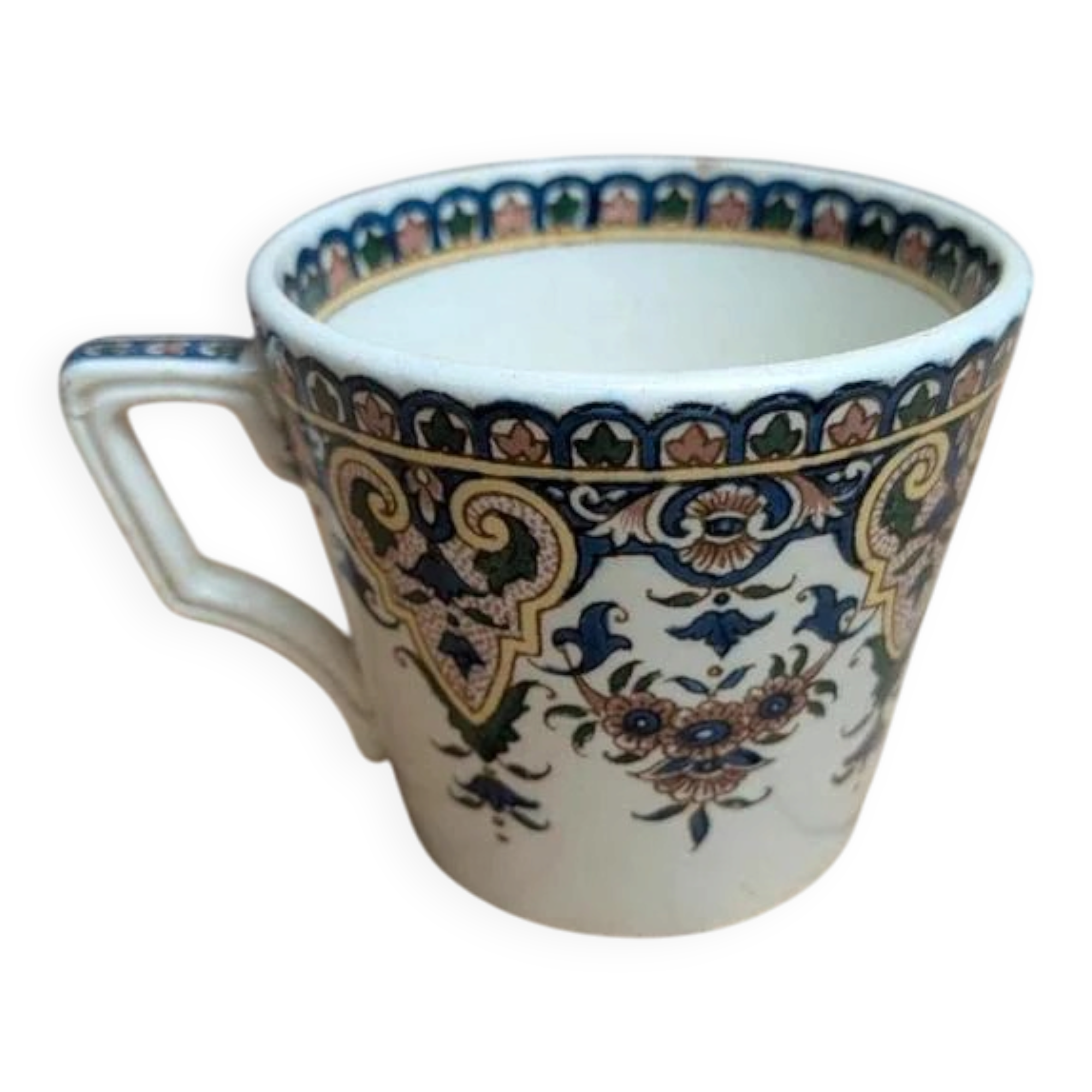 Antique ironstone cup from Sarreguemines with polychrome decoration.