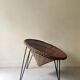 Italian sunflowers armchair in rattan and black metal, 1950s design.