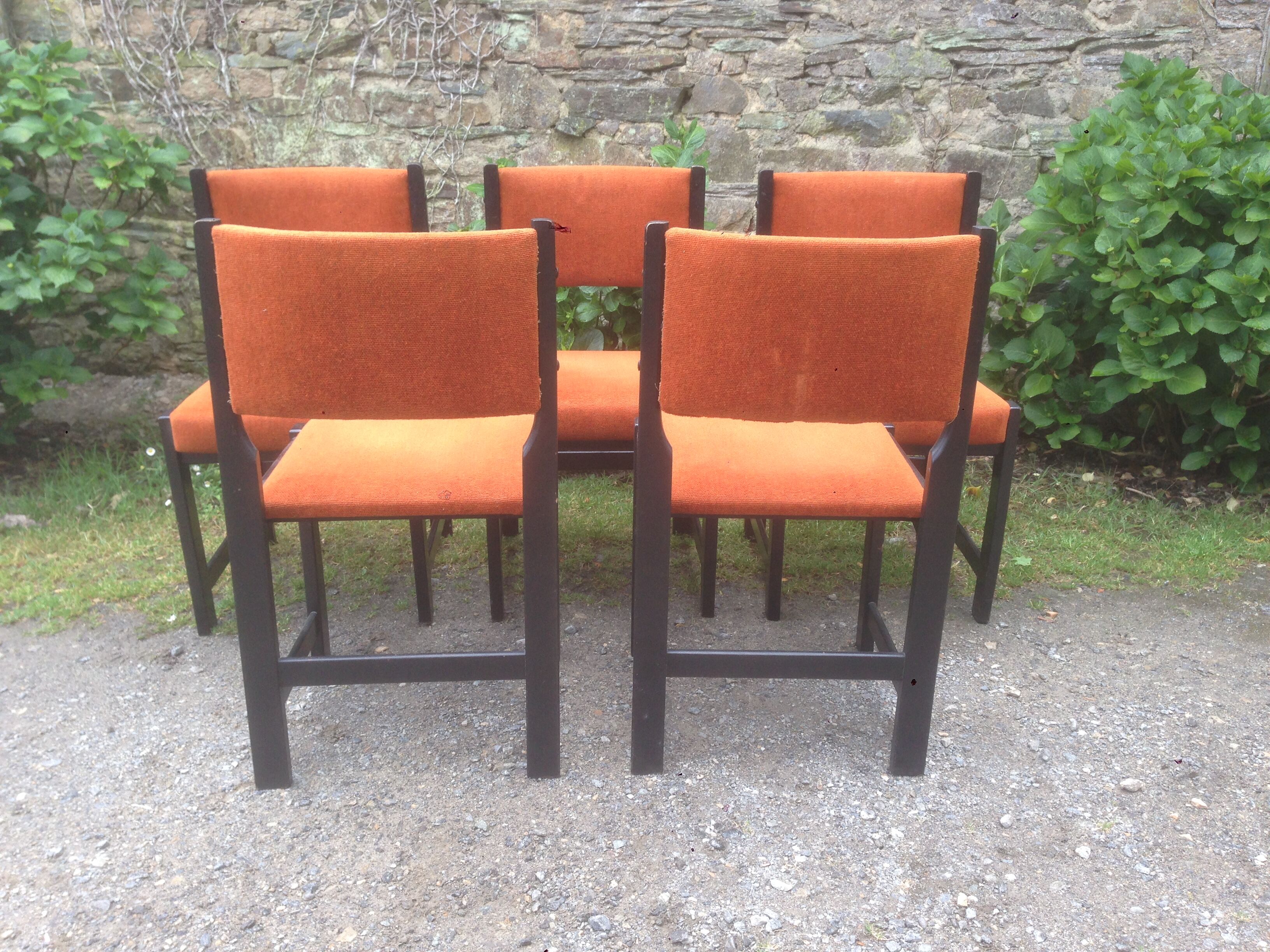 Series of 6 vintage chairs in orange fabric and black lace-up.