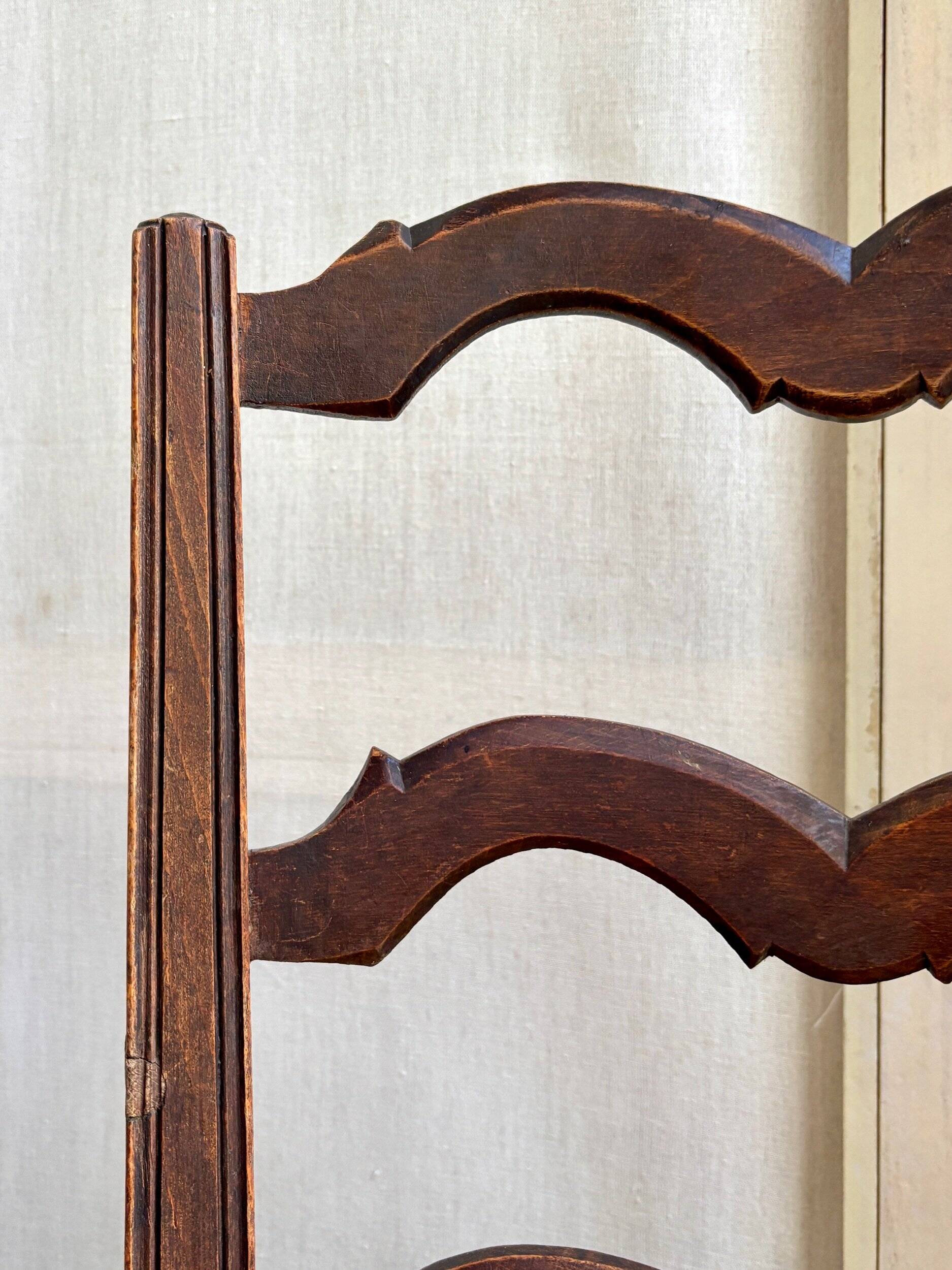 Low Provencal chair in dark wood and woven straw