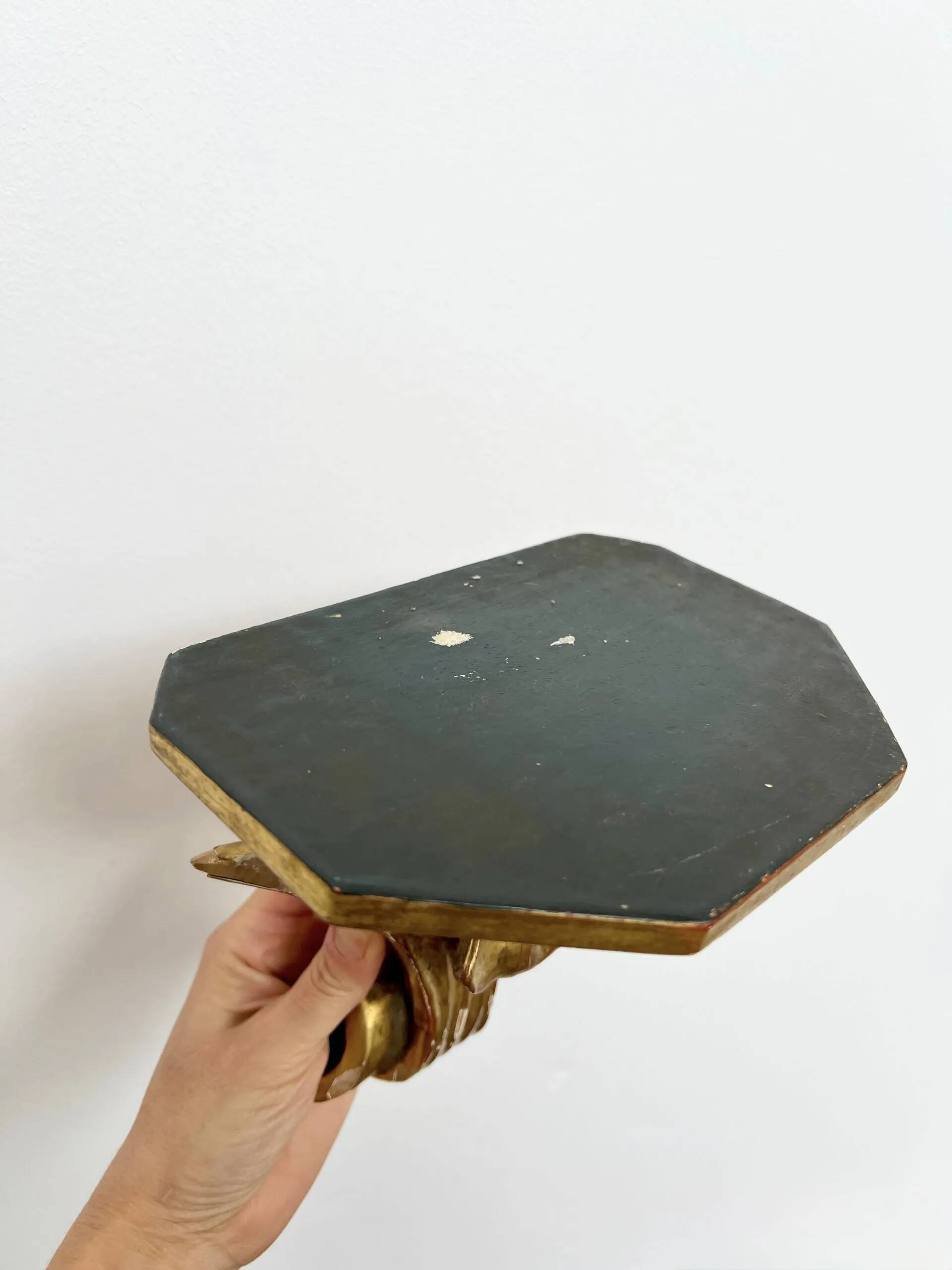 Wall-mounted console in painted gold wood