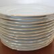 Set of 12 flat plates made of Limoges porcelain