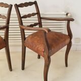 Pair of vintage leather armchairs