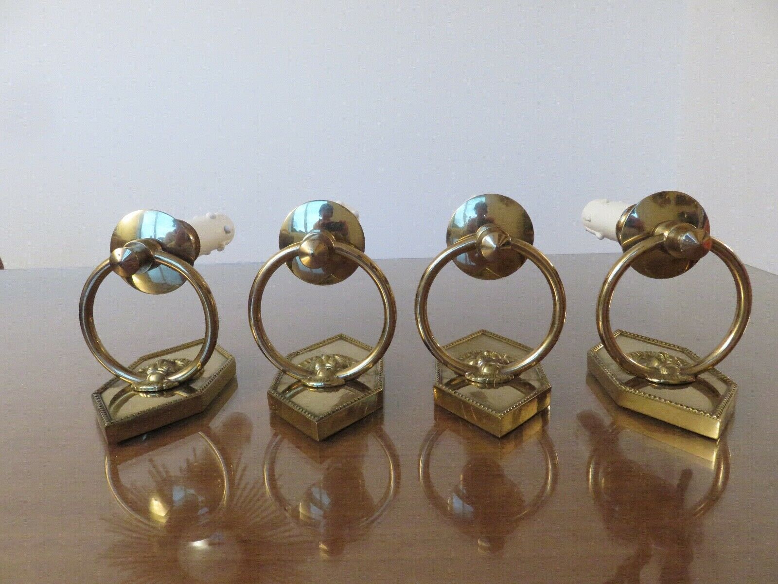 Series of 4 art deco sconces to lions in solid golden brass 40s 50s