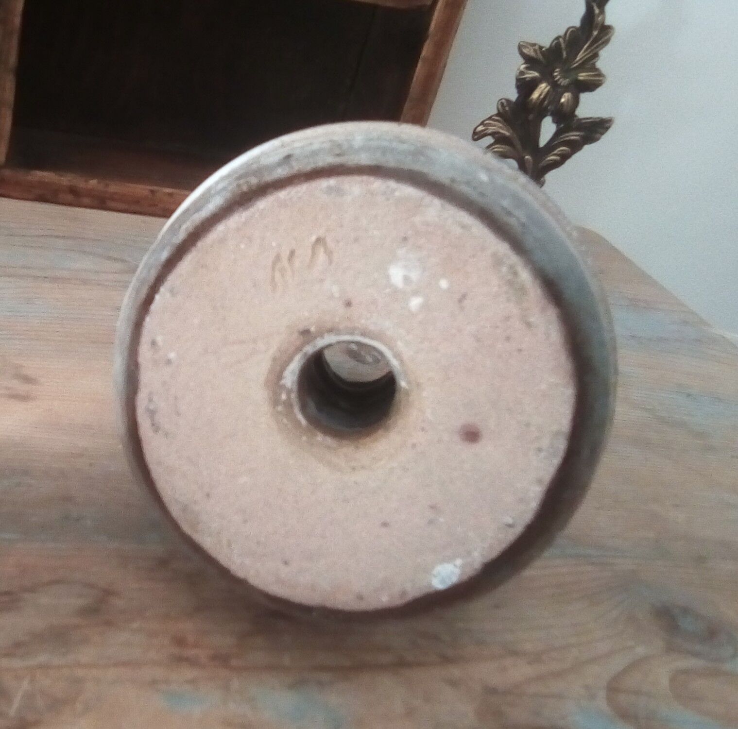 Pair of speckled sandstone candle holders