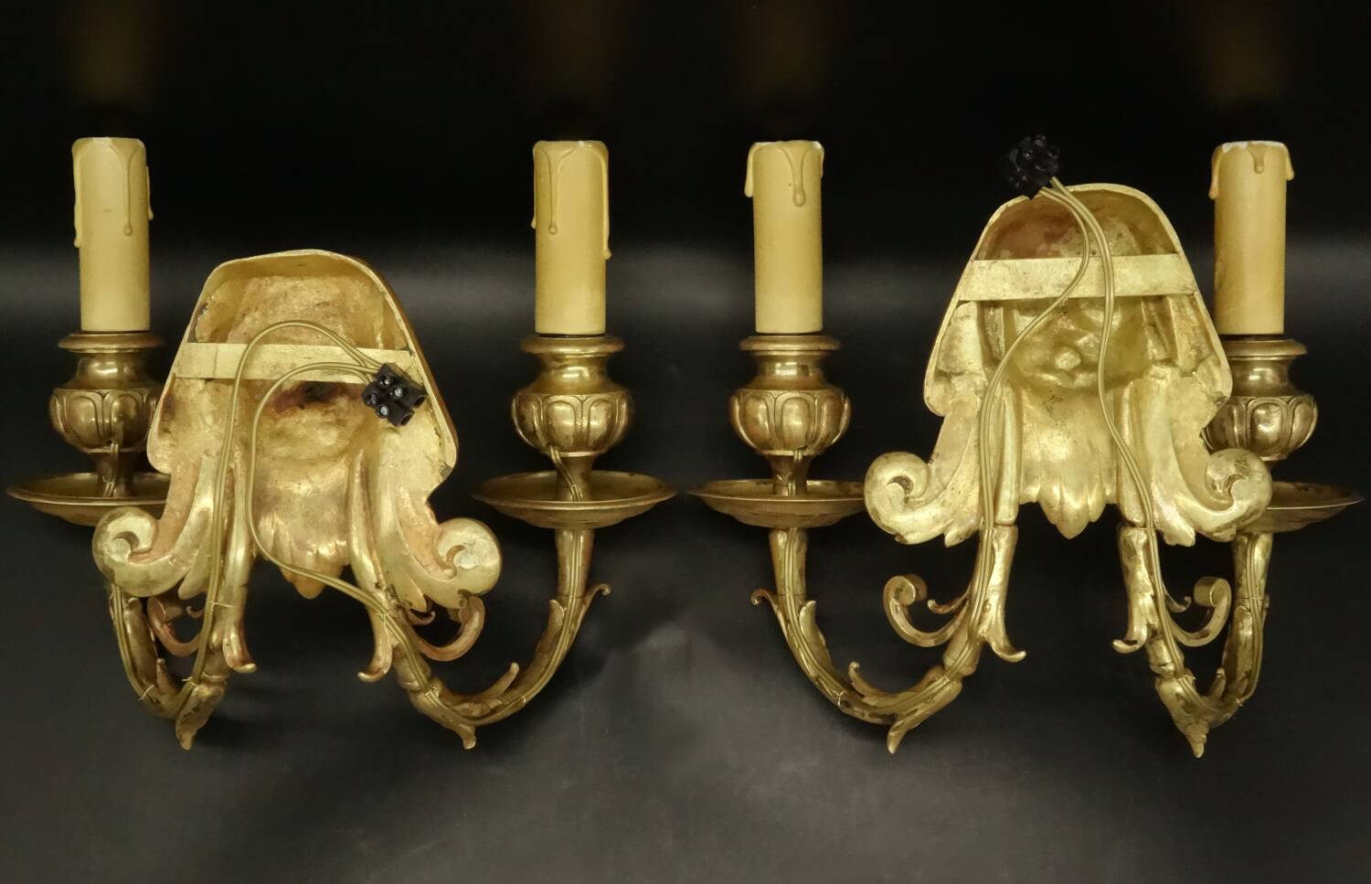 Pair of wall sconces with grotesque heads in 19th-century Renaissance style - bronze