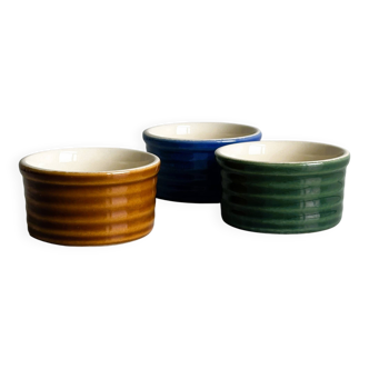 Trio of glazed ceramic ramekins
