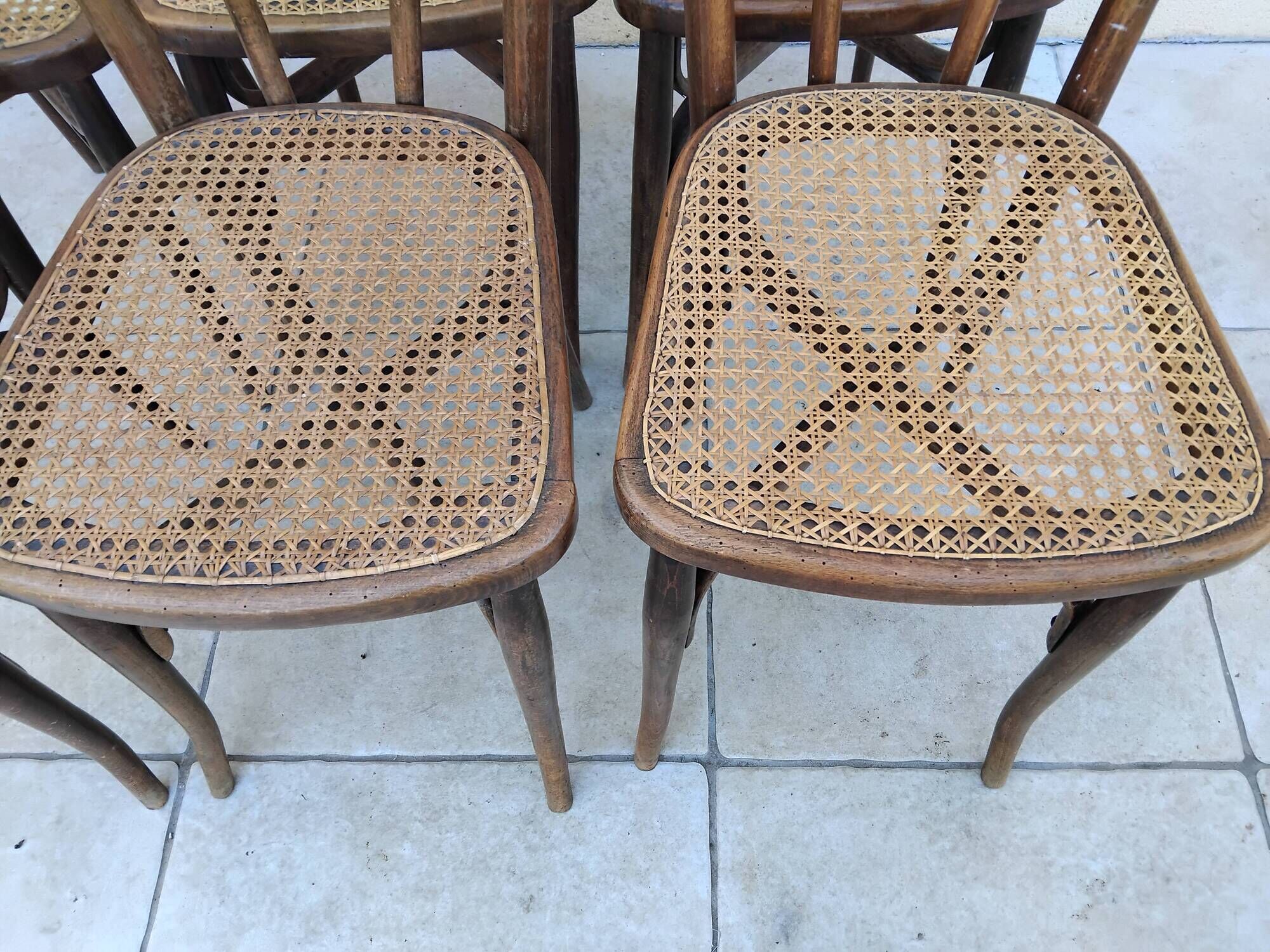 6 antique bistro chairs with curved wood and caning from 1900 L&H Cambier Frères