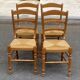 4 solid wood and straw Louis Philippe chairs from the 1960s.