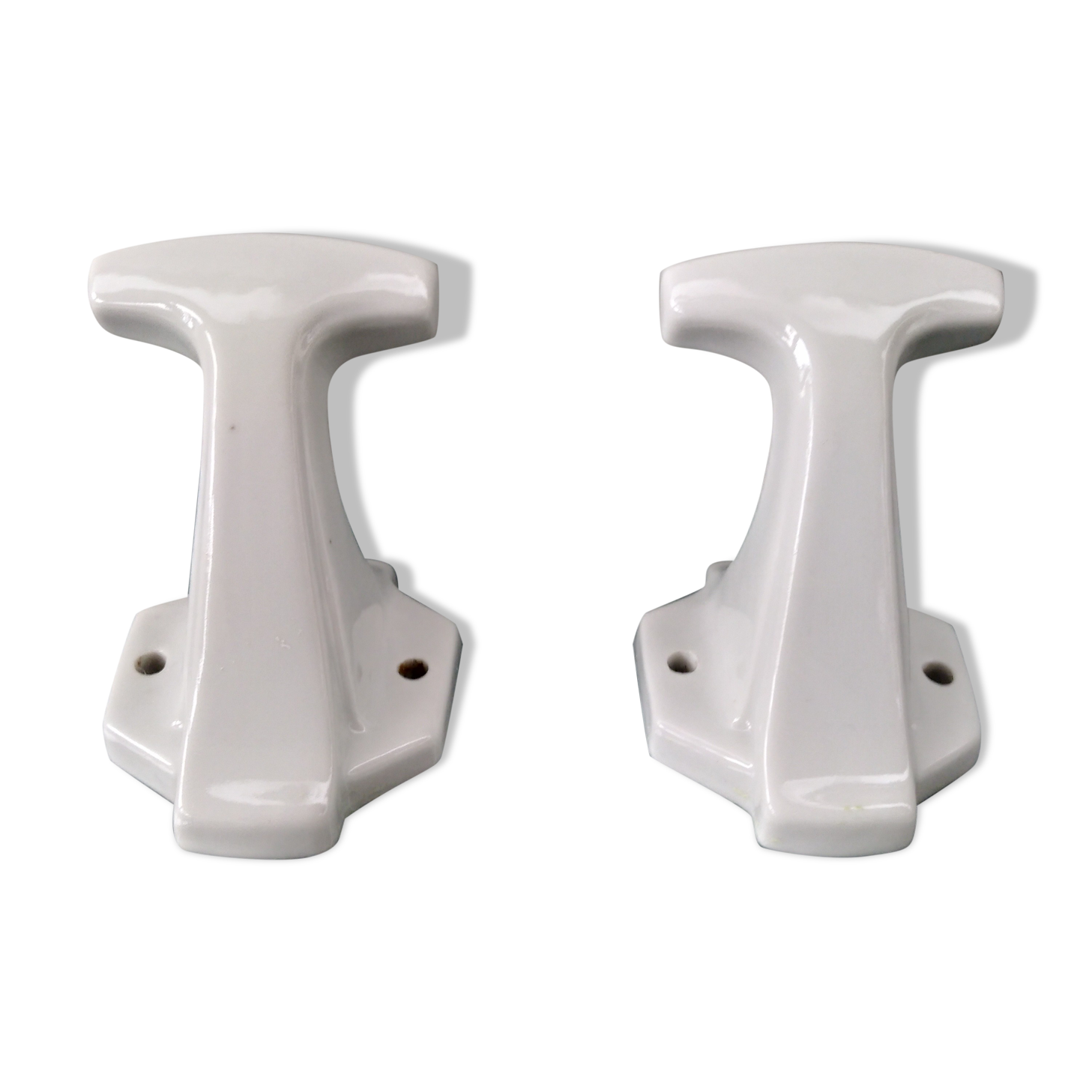 Pair of art deco porcelain coat racks