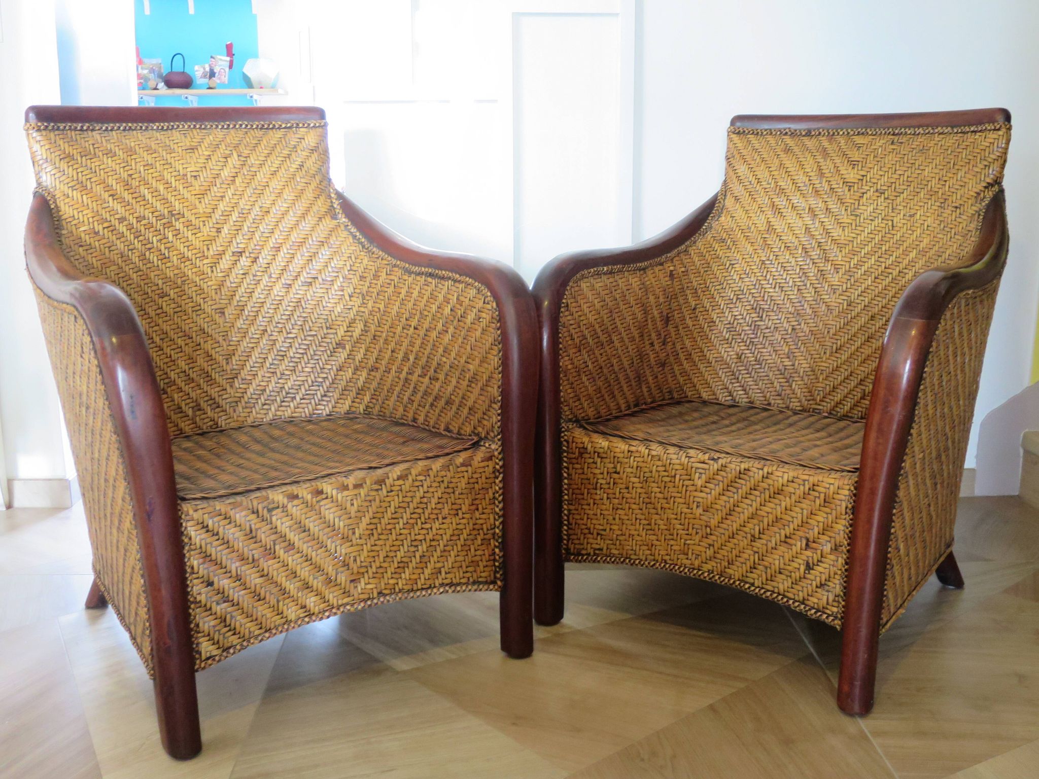 Set of 2 armchairs in woven rattan and exotic wood, 1980s