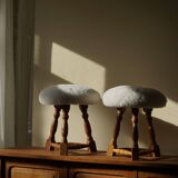 Modern Danish, a pair of tripod stools, seats reupholstered in lambswool, 1950s.