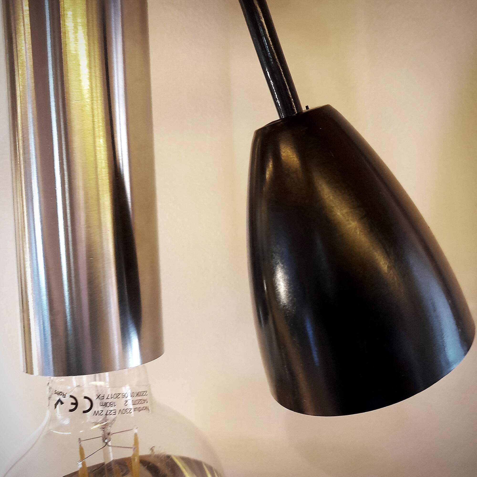 Pair of still tube pendant lights in polished stainless steel, 1970s, new