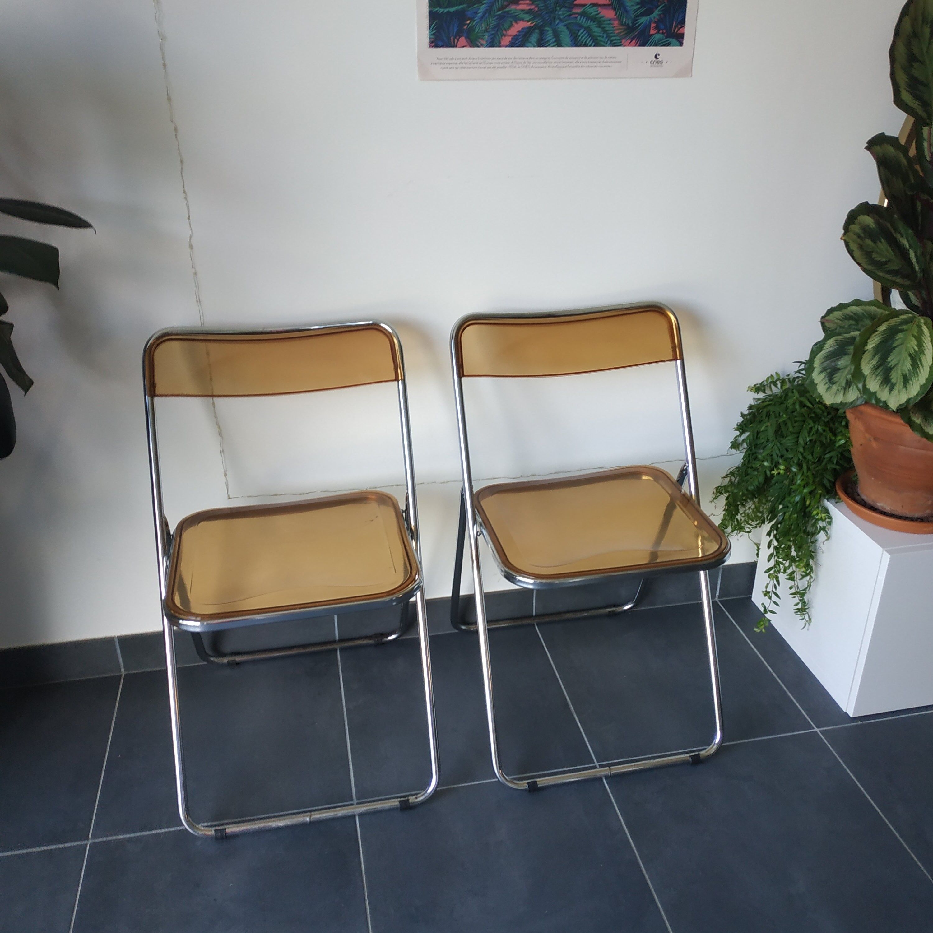 Seventies stainless steel and caramel chairs