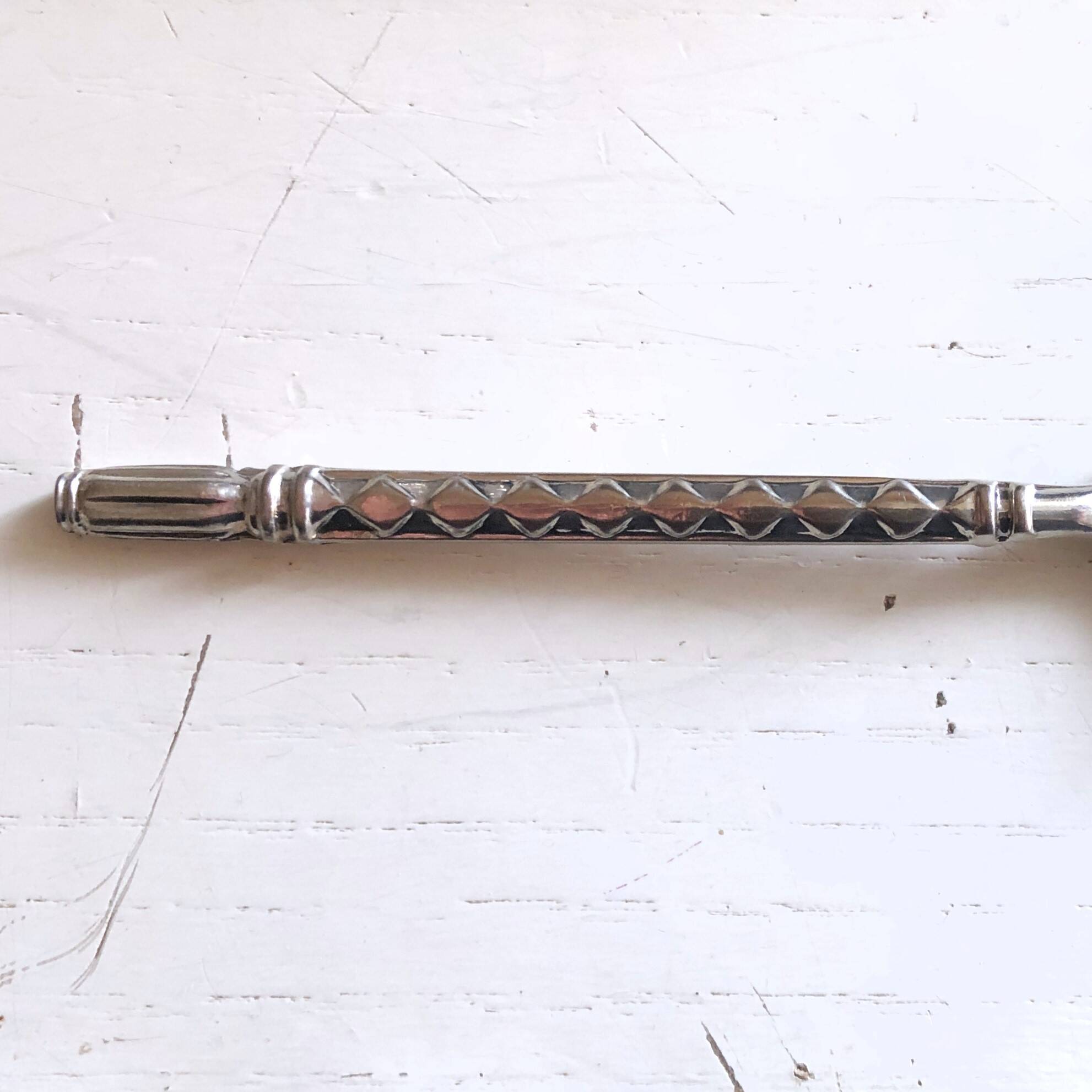 Glass salt and pepper shaker set with vintage serving spoon