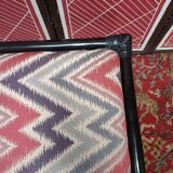 Rattan ottoman stool with woven seat