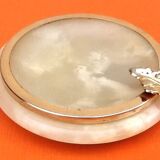 1970s Onyx ashtray with a gold metal rim.