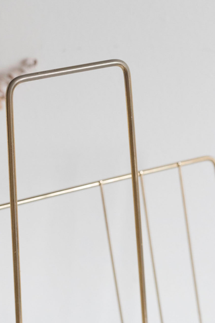 Vintage magazine holder in gold metal