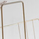 Vintage magazine holder in gold metal