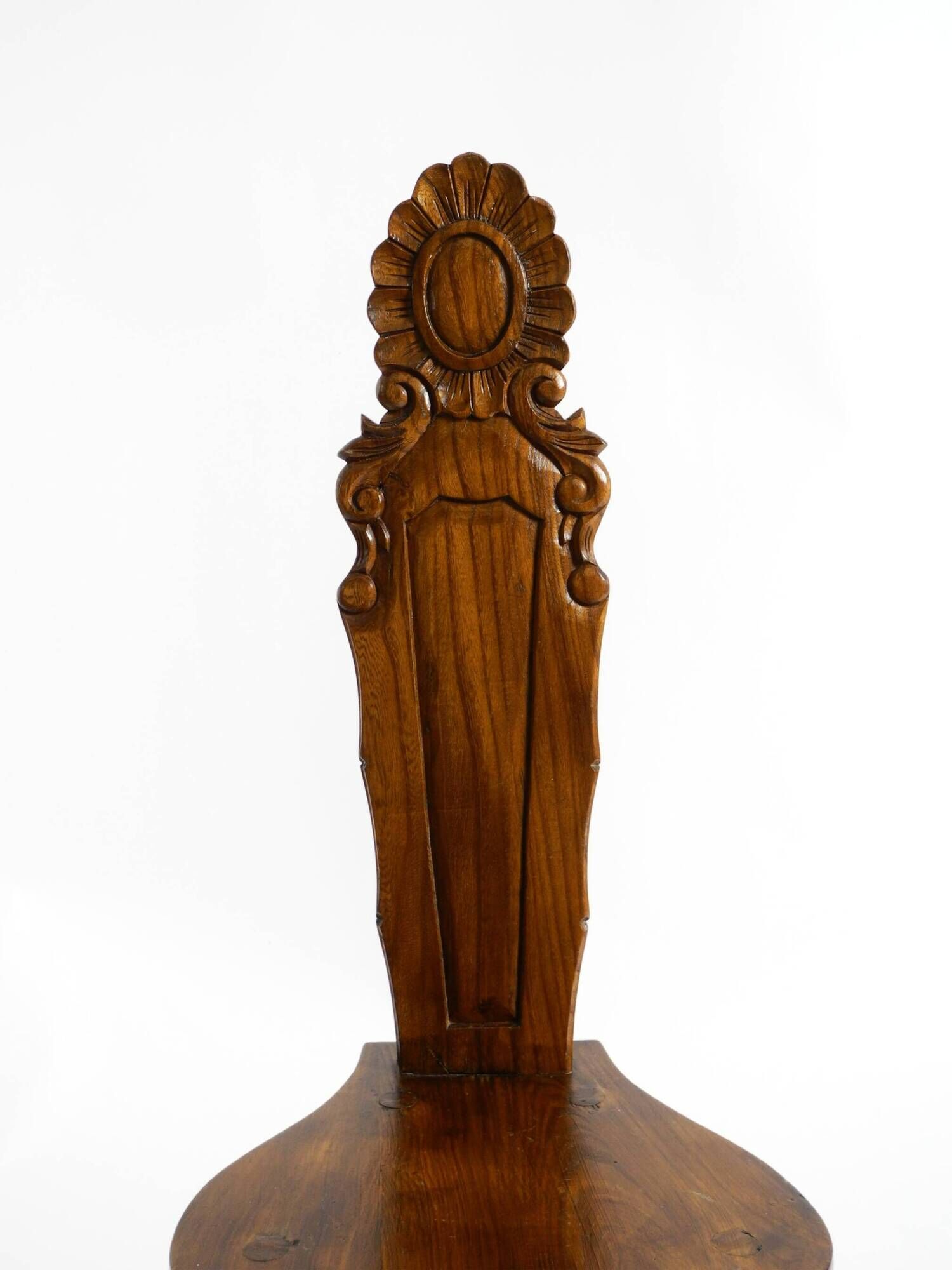 Solid wood chair with an ornate, hand-carved backrest – Made in Spain