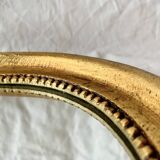 Vintage wall mirror in gilded wood