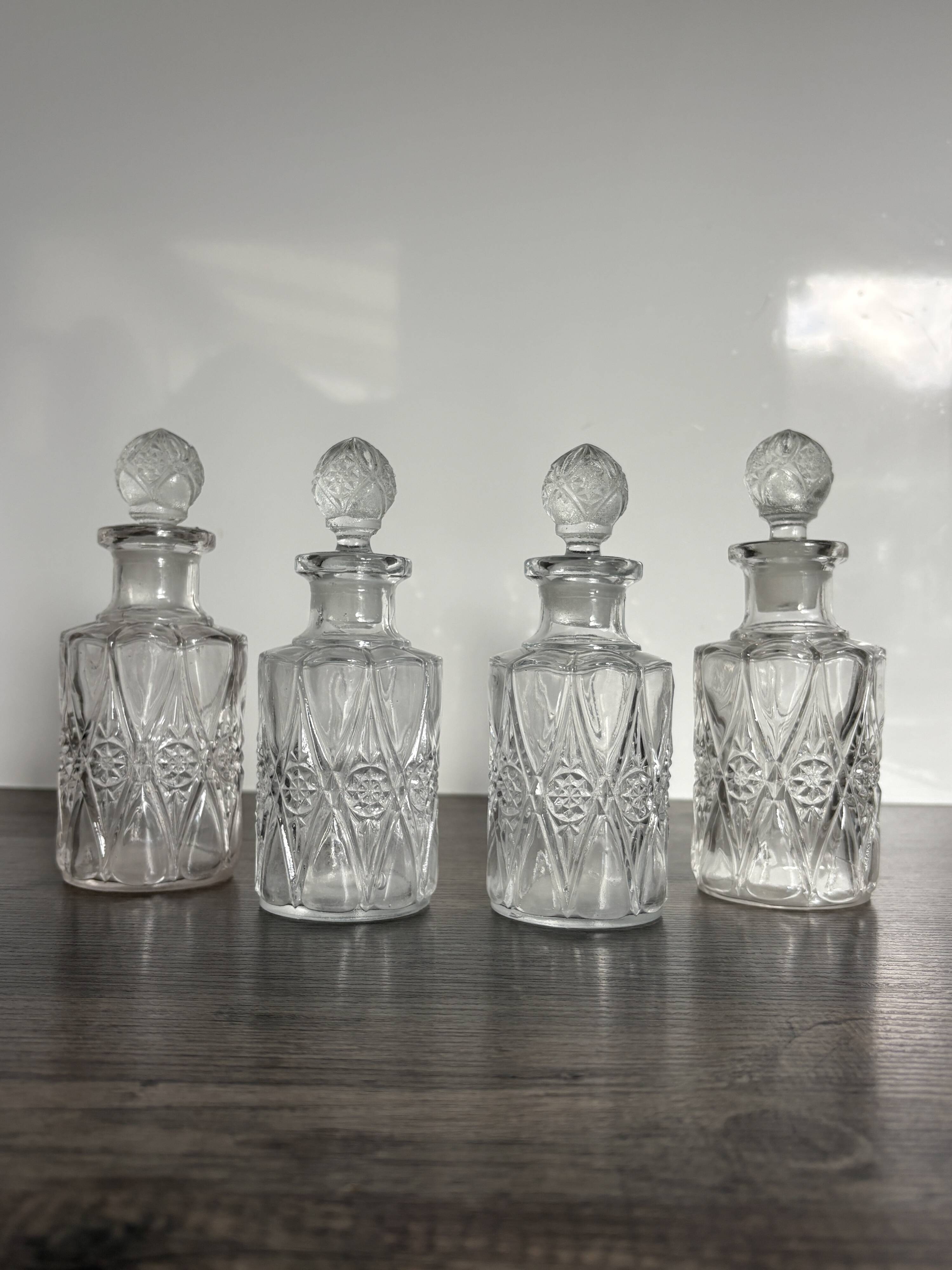 Set of 4 molded crystal bottles – Val Saint Lambert