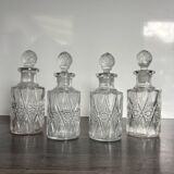 Set of 4 molded crystal bottles – Val Saint Lambert