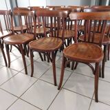 Suite of 12 chairs of bistrot Baumann 1940s