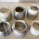 Six bougeoirs en marbre