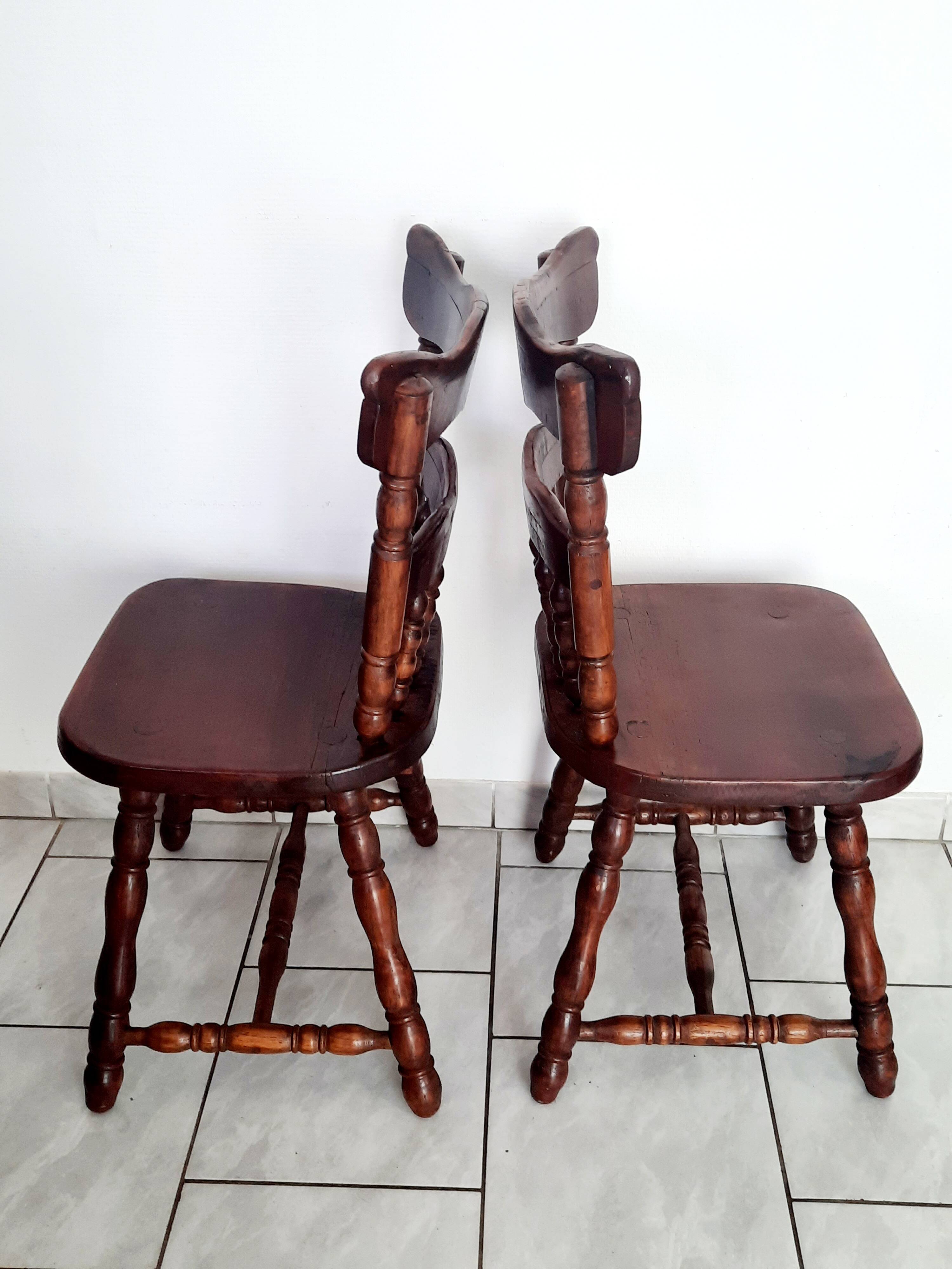 Pair of solid wood saloon chairs from the 60s and 70s