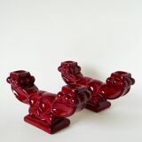 Pair of large burgundy ceramic candlesticks, 1950
