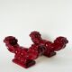Pair of large burgundy ceramic candlesticks, 1950