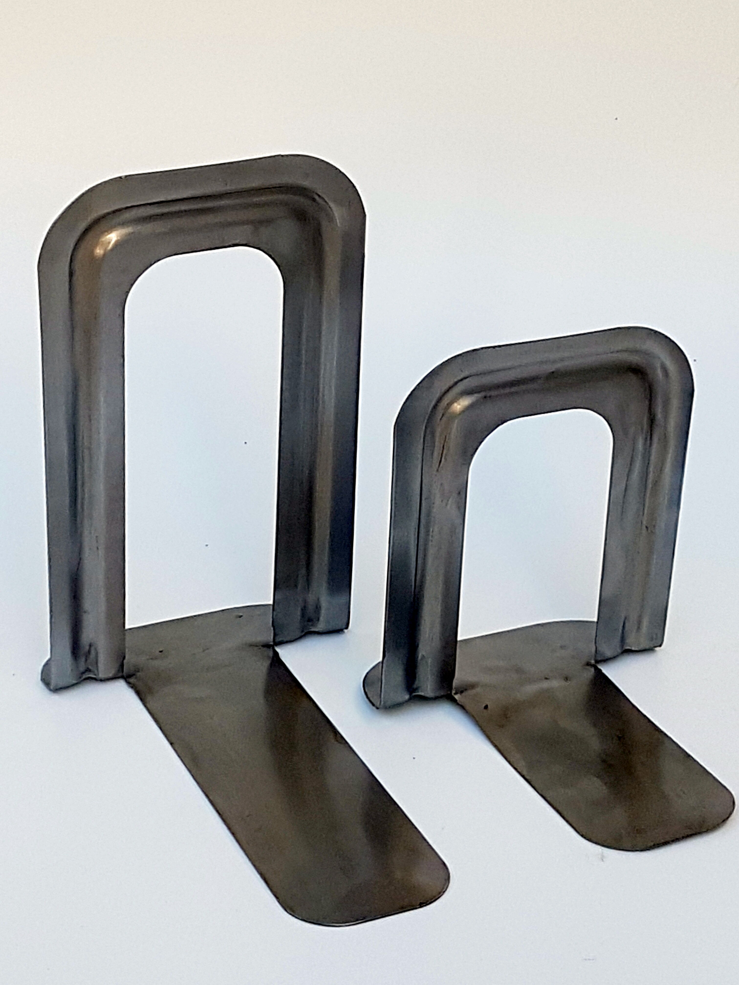 Metal book clamsended by Bernard-Albin Gras for Gras Ravel