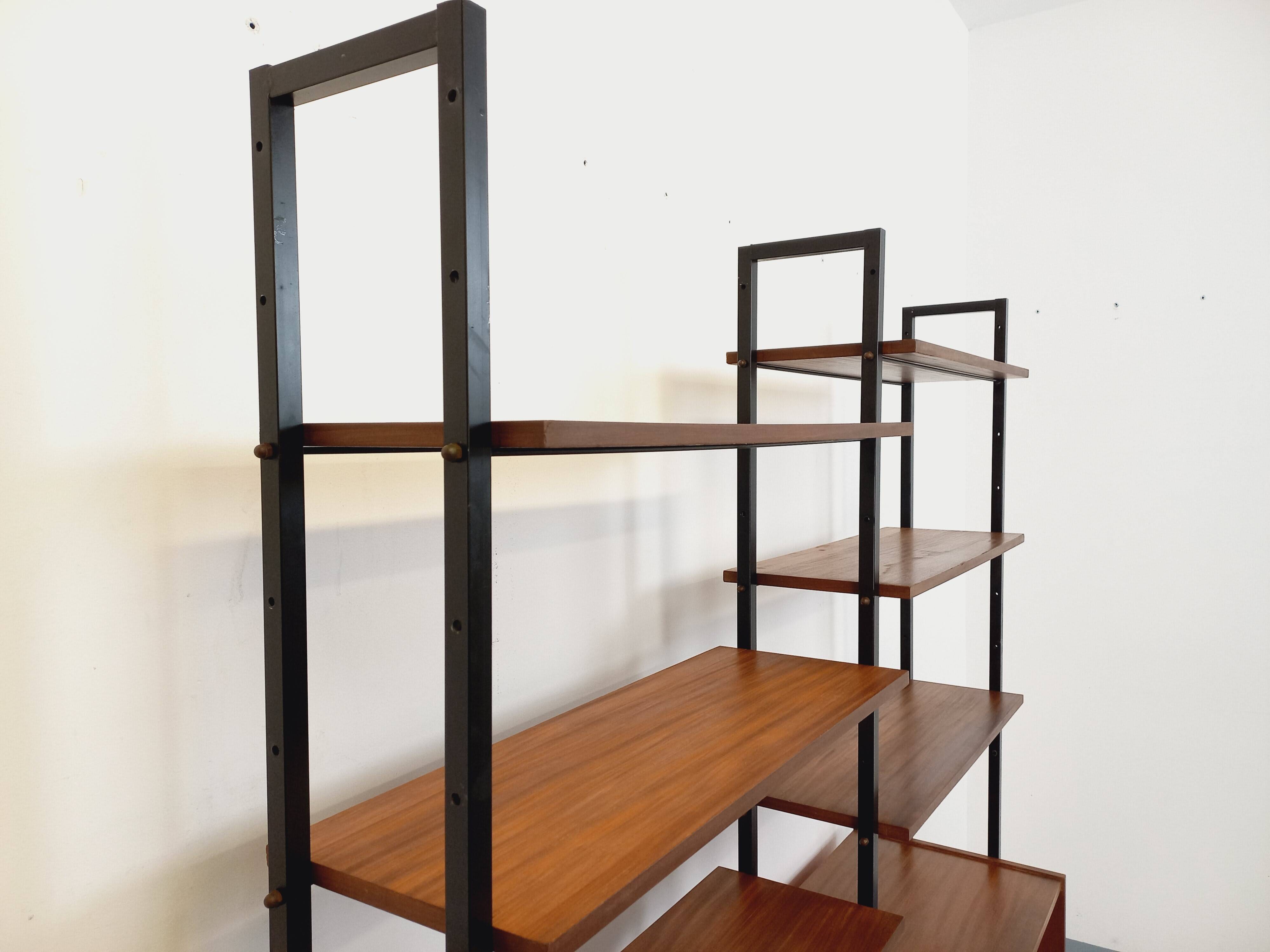 Vintage Italian double modular bookshelf in teak and metal.