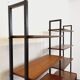 Vintage Italian double modular bookshelf in teak and metal.
