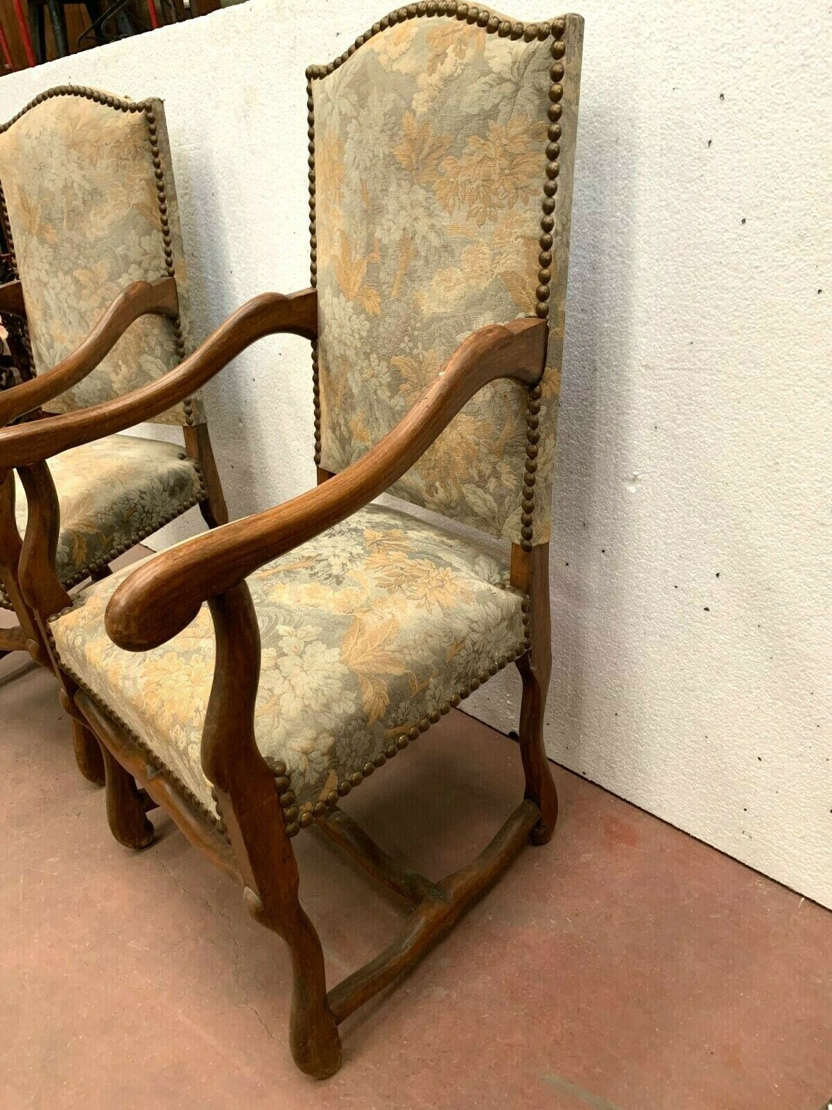 Pair of renaissance style armchairs in tinted beech XX century