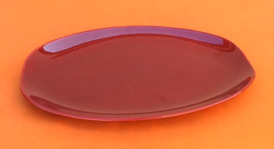 Oval serving dish burgundy-coloured glazed ceramic