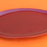 Oval serving dish burgundy-coloured glazed ceramic