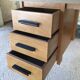 Desk with drawers and tubular metal feet