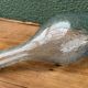Biot blown glass bottle