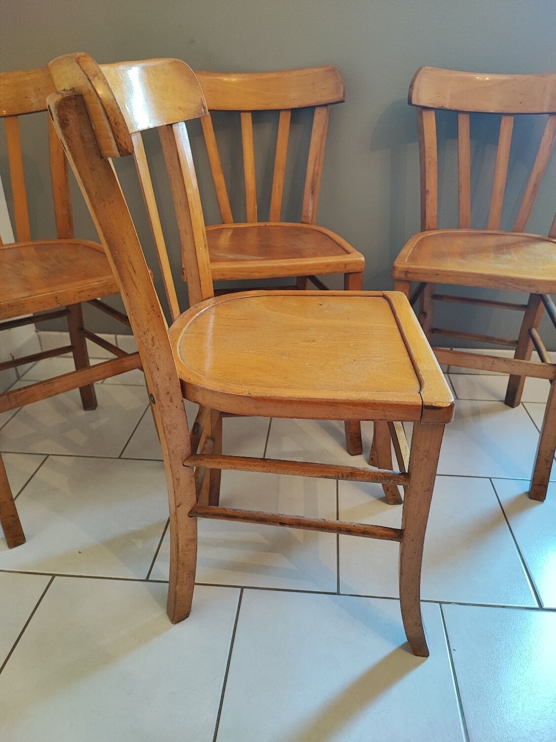 Vintage four-quarter bistro chairs