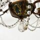 Louis XVI style chandelier with a pearl garland and painted tin, 20th century.